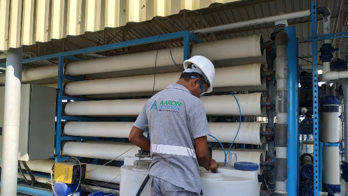 Aaron Tech employee working on an RO system
